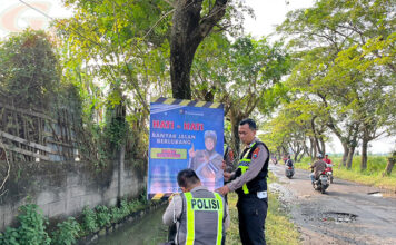 Peringatan di Jalan Berlubang